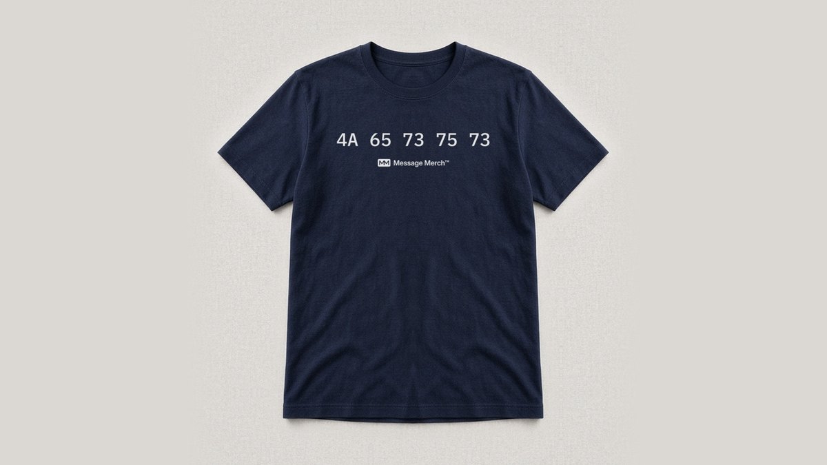 Navy shirt printed with five pairs of hex characters in one line, left to right, that spell Jesus, with the Message Merch logo under them